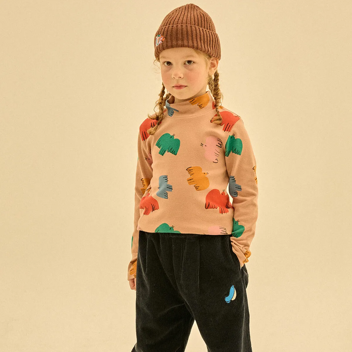 Colourful Bird Turtleneck T-Shirt by Jelly Mallow