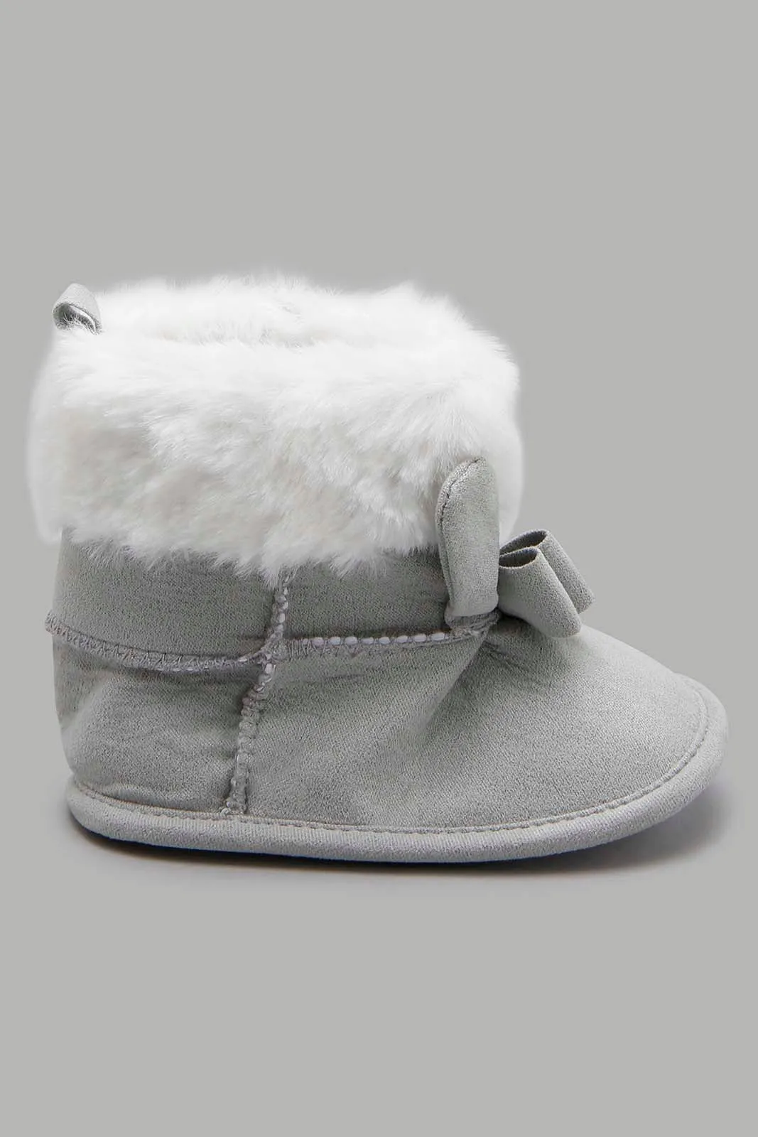 Grey Boot With a Bow