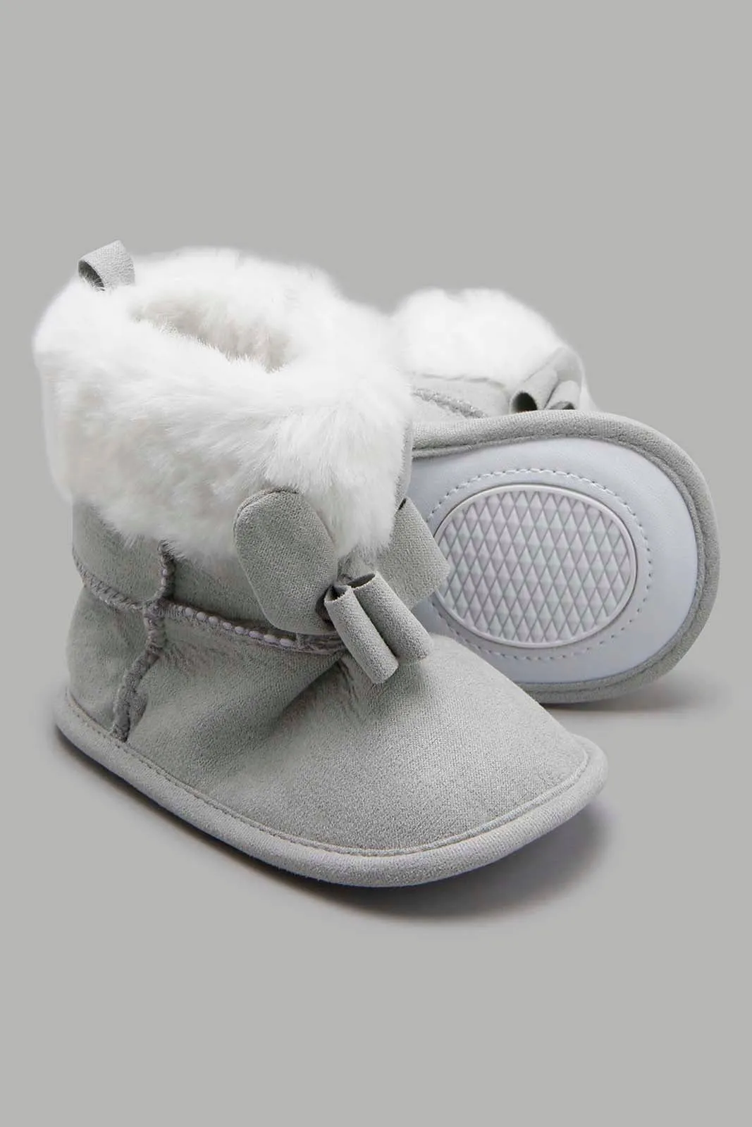 Grey Boot With a Bow